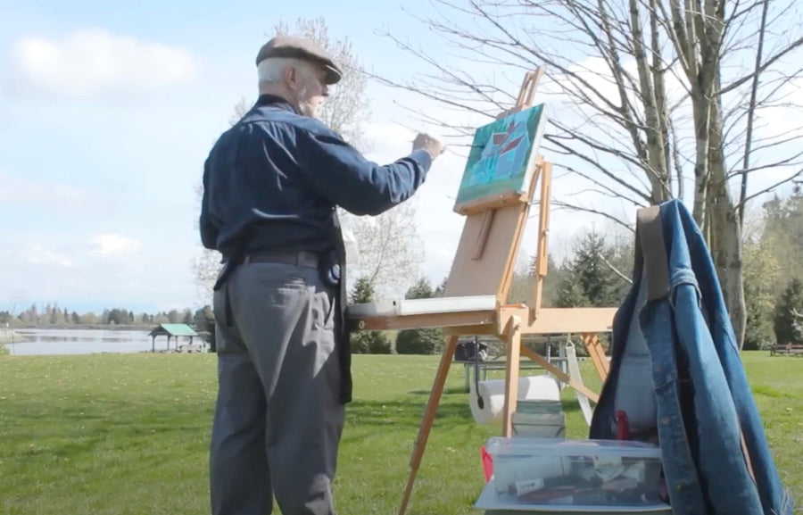 artist painting outdoors with Golden OPEN Acrylics